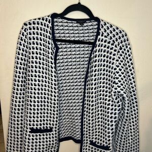 Blue, black and white sweater